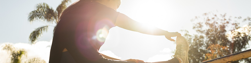 woman stretching before a run